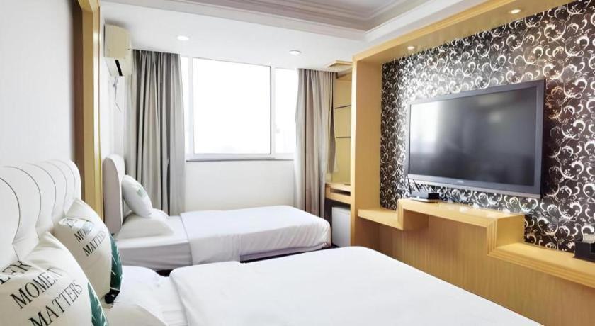 Wings Hotel Guangzhou Buitenkant foto